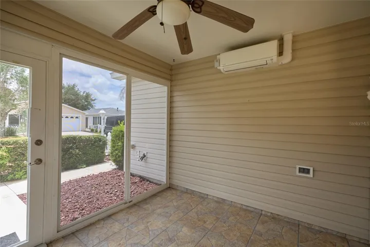 Glass enclosed lenai with AC