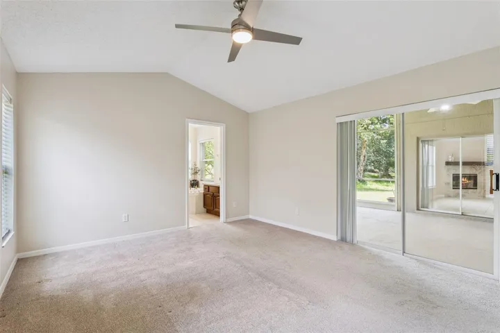 Primary bedroom with access to back patio