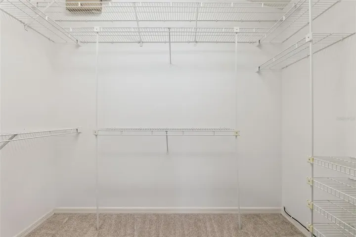 Large walk in primary closet