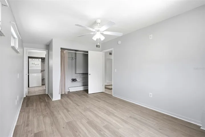 primary bedroom with multiple closets