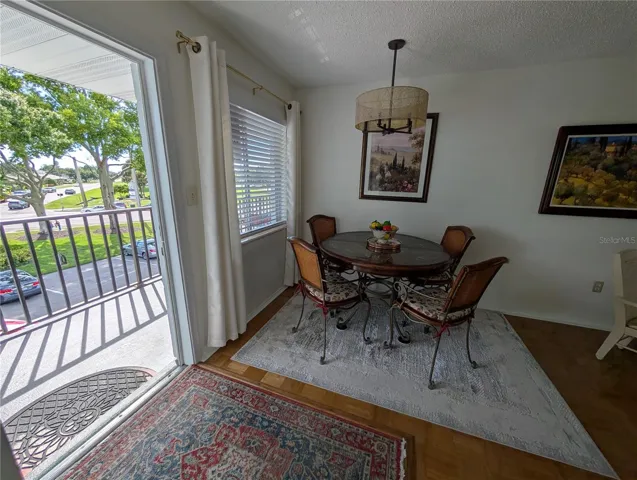 Excellent vantage point! NOT looking at another condo - just trees, shade, activity below on street.