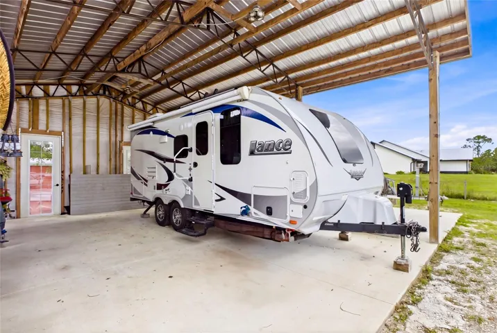 Pole barn used to store camper