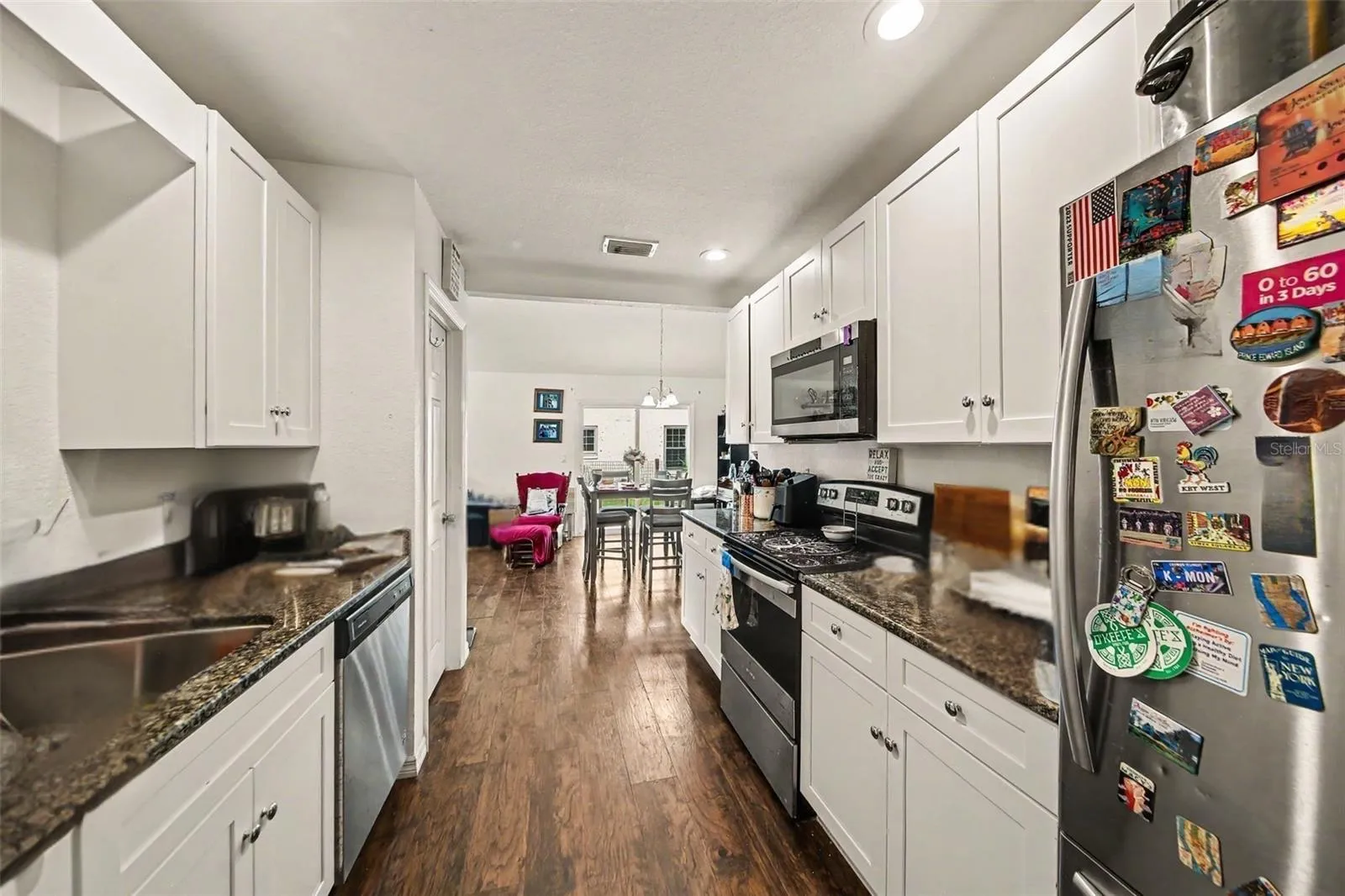 Smart galley way kitchen design with counter space. Appliances installed 2021.