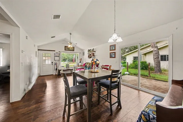 An Airy spacious feel as soon as you walk in the front door... Oversized window and sliding door bring illuminate this home with natural light.