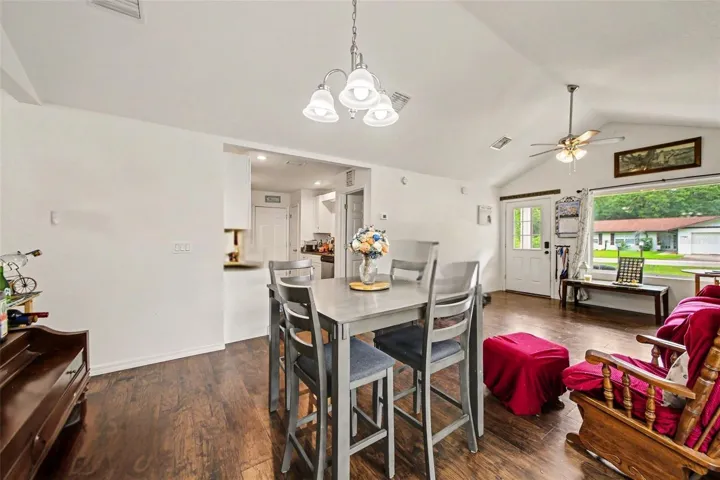 Galley Way kitchen off the living room connects to the garage for easy grocery transport. This kitchen offers a pantry and an appropriate amount of cabinet space.