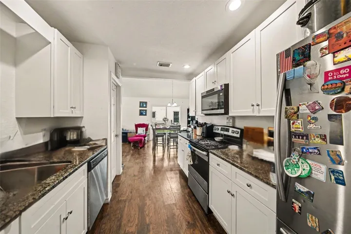 Smart galley way kitchen design with counter space. Appliances installed 2021.