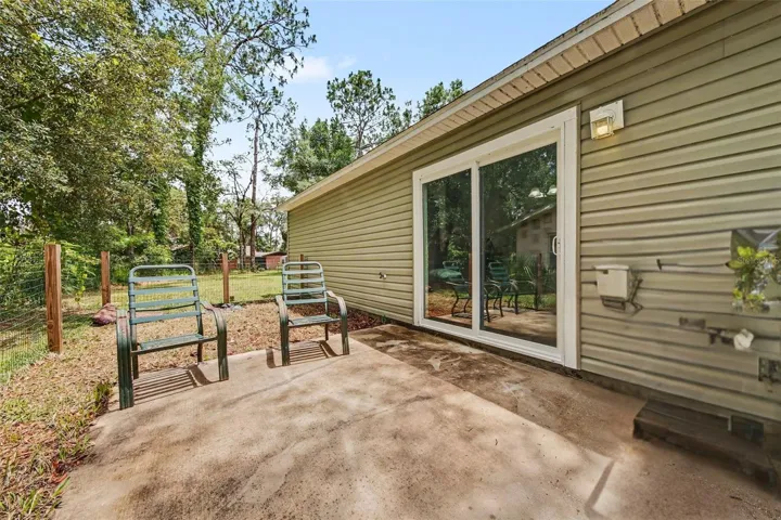 Space to enjoy the sunshine, doggie bath station, and herb garden :)