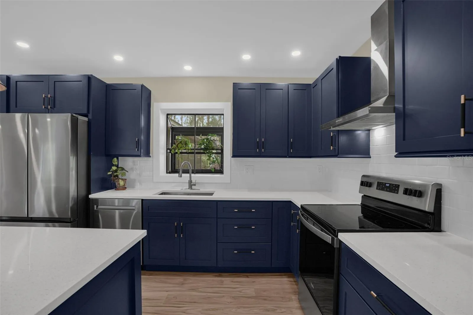 Open-concept kitchen designed for entertaining with premium finishes and abundant workspace.