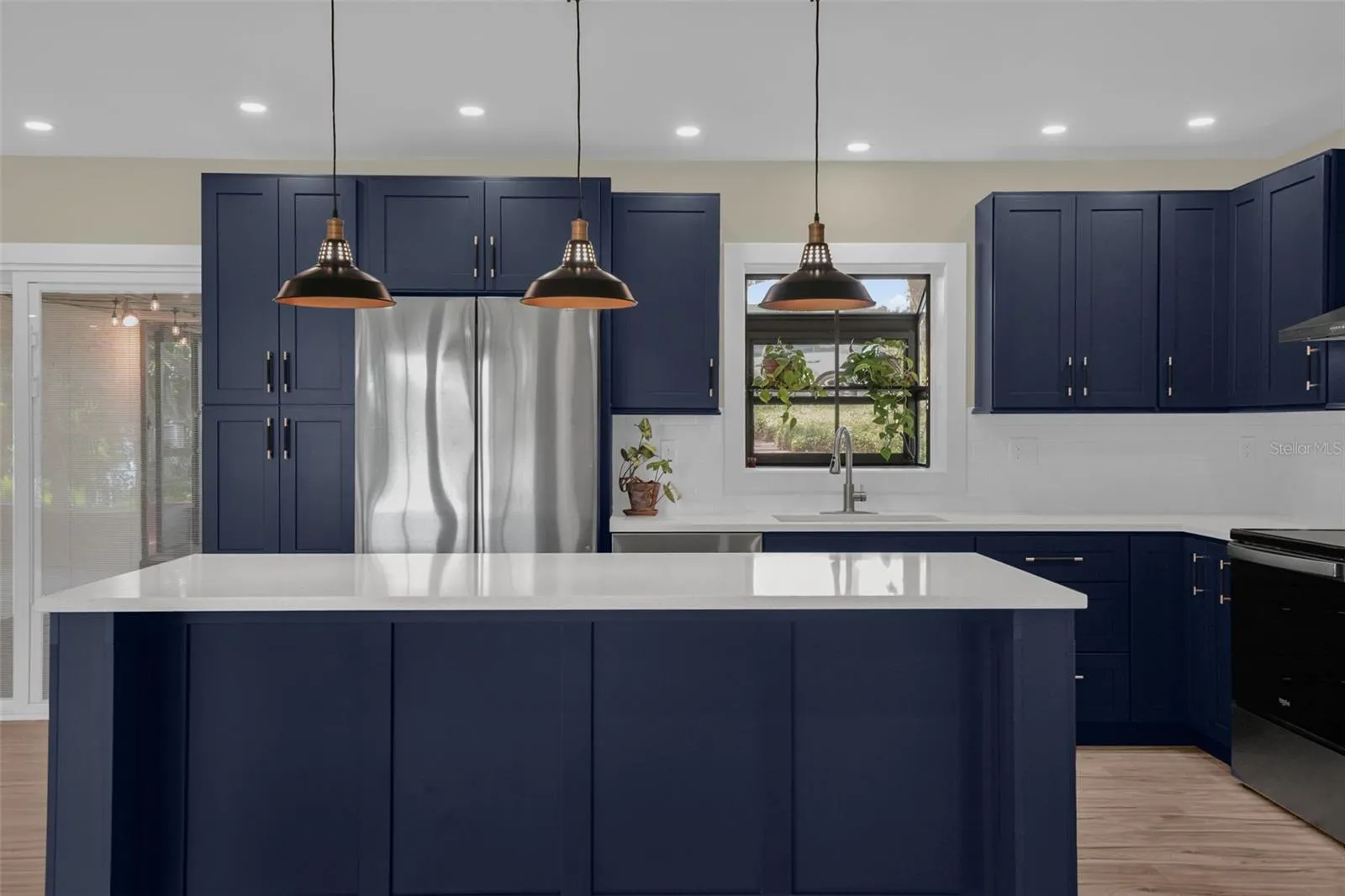 Another view of the stunning 2026 kitchen remodel featuring custom cabinetry, quartz countertops, and modern finishes.