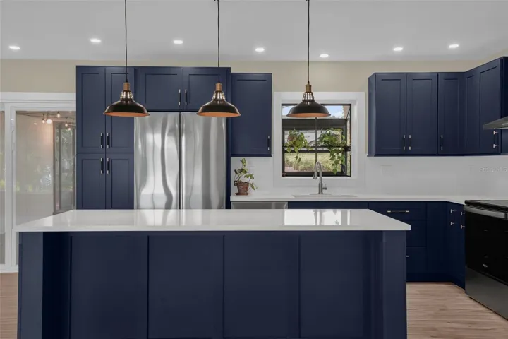 Another view of the stunning 2026 kitchen remodel featuring custom cabinetry, quartz countertops, and modern finishes.