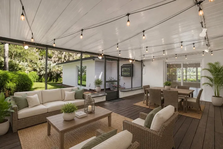 Virtually staged screened-in patio showcasing the perfect space for relaxing and entertaining