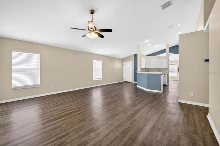 Open floor plan with separate dining area