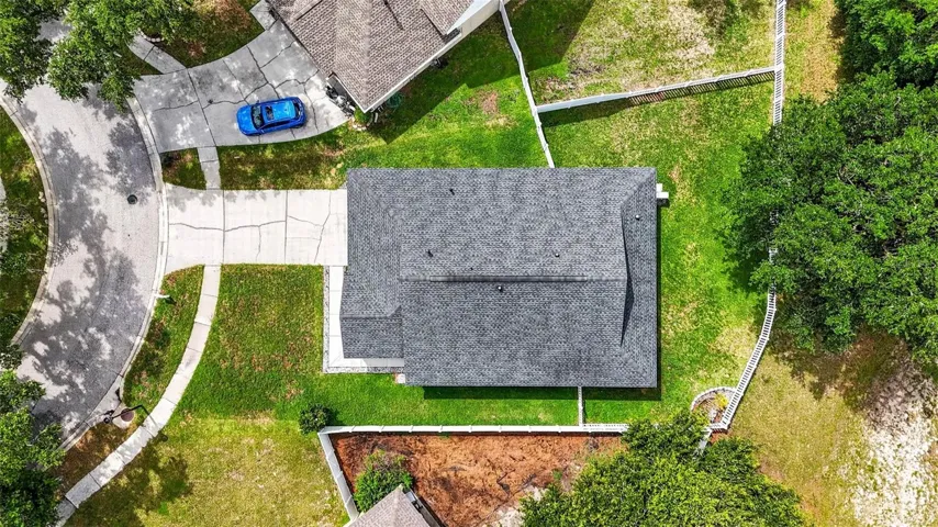 Large fenced in yard, conservation area in the rear.
