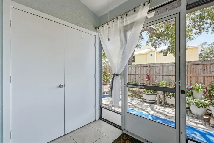 Relax in the private screened in porch.