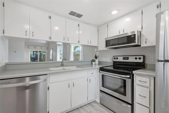 Kitchen with stainless steel appliances.