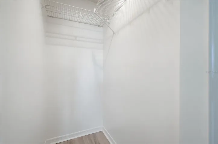 Large walk-in closet located in the Primary Bedroom.