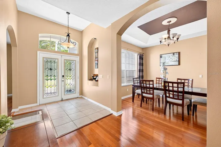 The light and bright foyer and flexible living and dining spaces set the tone for a great layout filled with possibility!