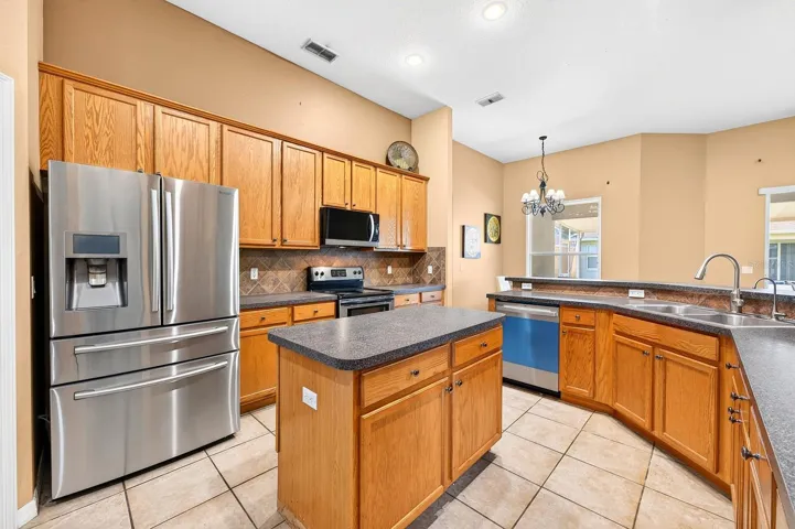 The kitchen sits at the heart of the home and opens seamlessly to the family room and casual breakfast nook, making it perfect for everyday living and entertaining.