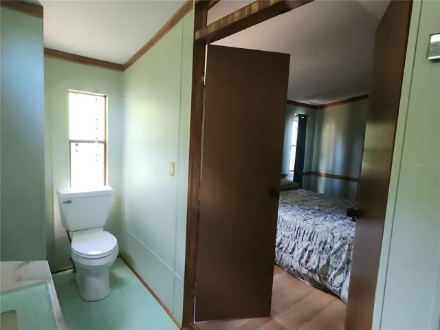Master bathroom looking into master bedroom