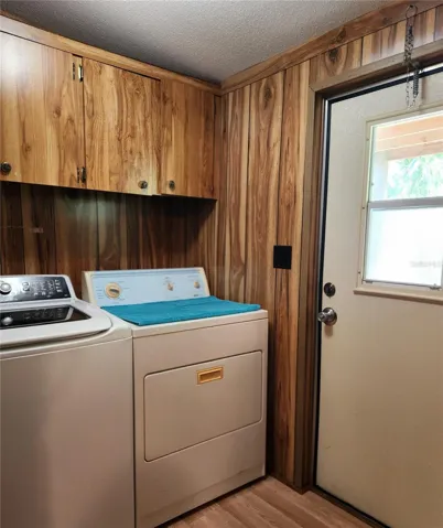 View of front door and laundry area.