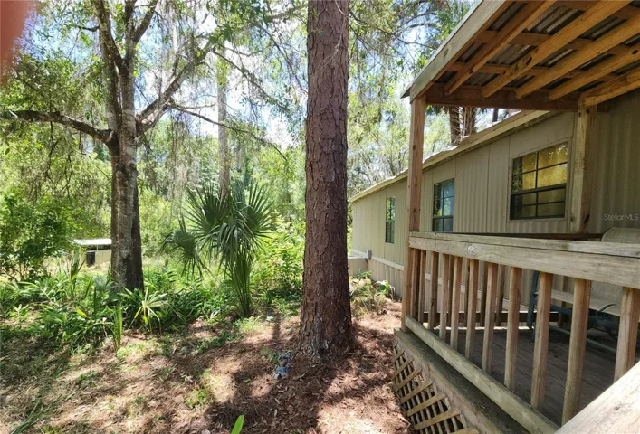 view of front of house and pump house