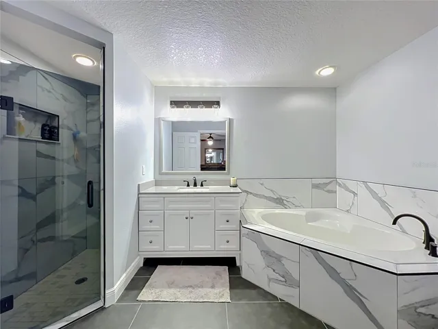 Primary Bath with shower and soaking tub