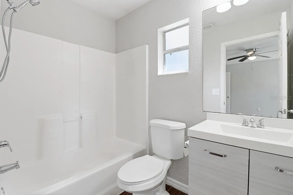 NOTE: Interior photos are from next-door duplex unit for sale by the same owner. Floor plans are identical.