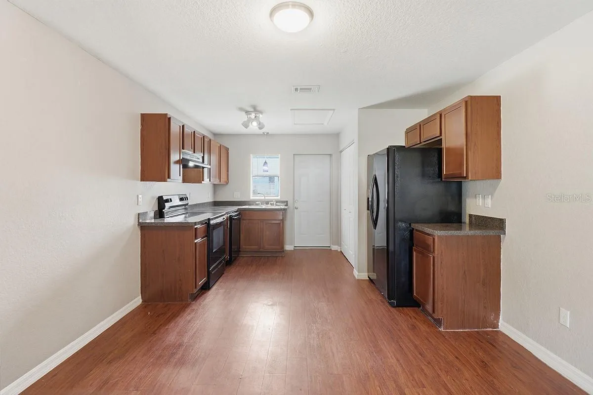 NOTE: Interior photos are from next-door duplex unit for sale by the same owner. Floor plans are identical.