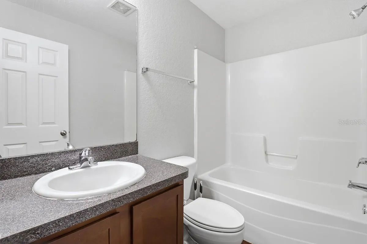 NOTE: Interior photos are from next-door duplex unit for sale by the same owner. Floor plans are identical.