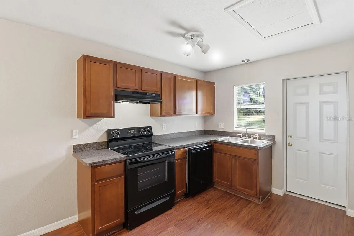 NOTE: Interior photos are from next-door duplex unit for sale by the same owner. Floor plans are identical.