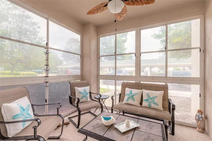 Screened coved patio that can be used as florida room