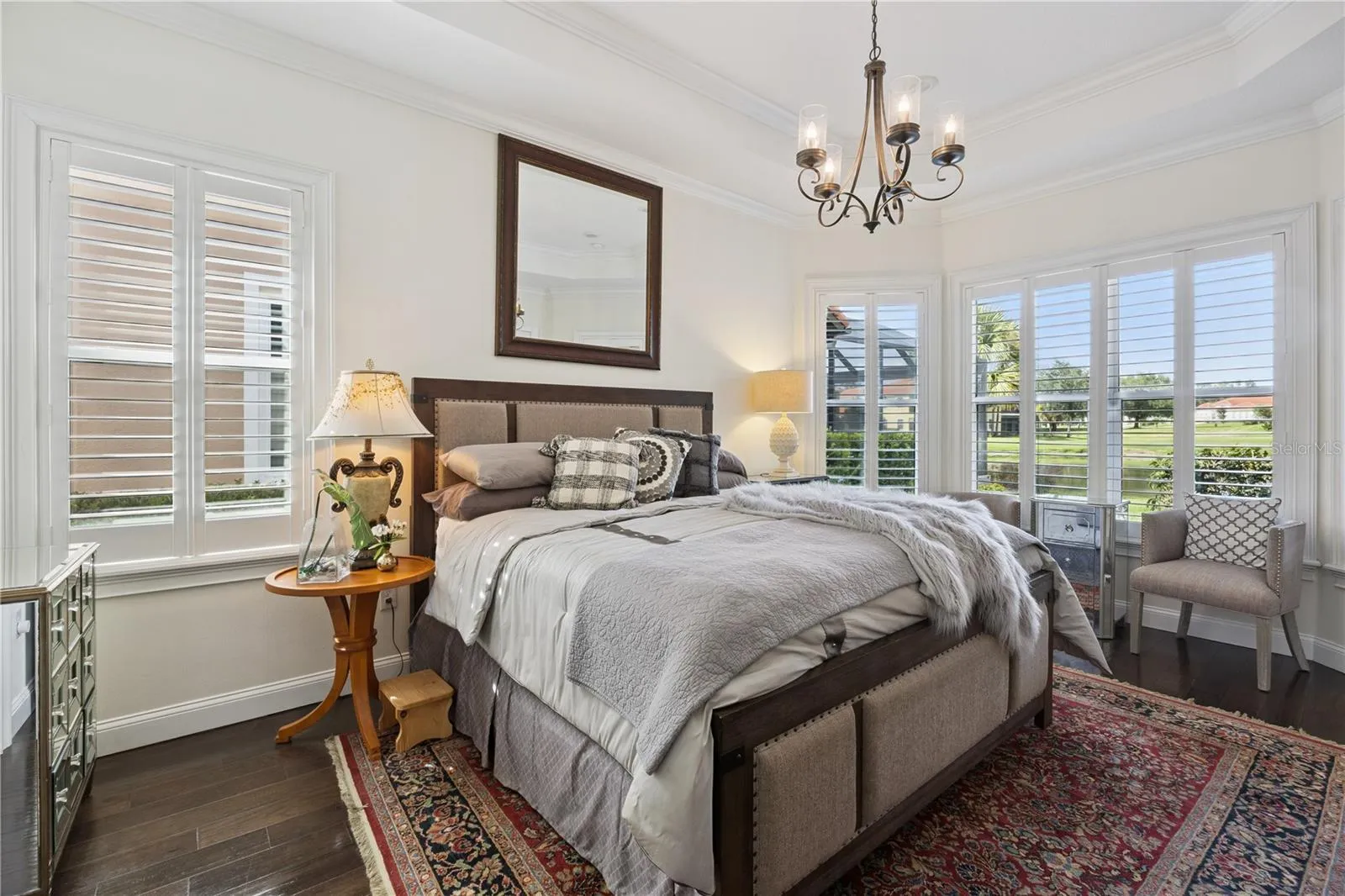 Beautiful Master with tray ceilings with crown molding.