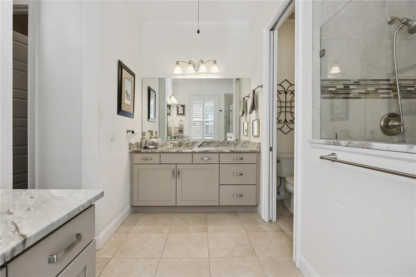 Stunning Master Bath with His & Her vanities plus Shower.