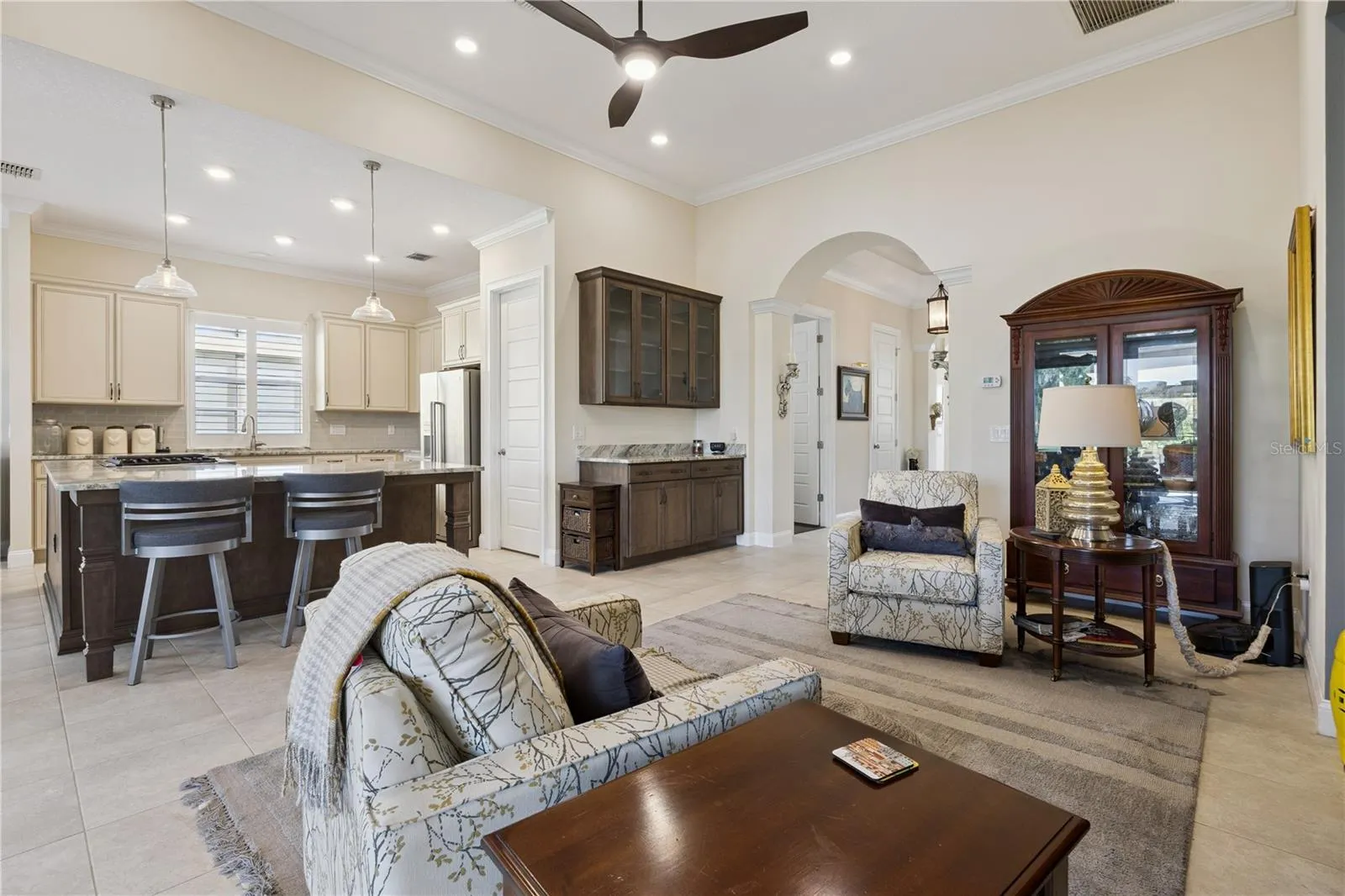 Stunning arch way to living area.