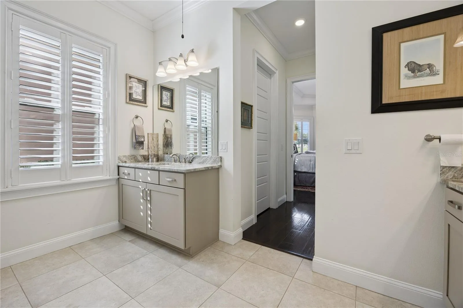 Master bath with plantation shutters.