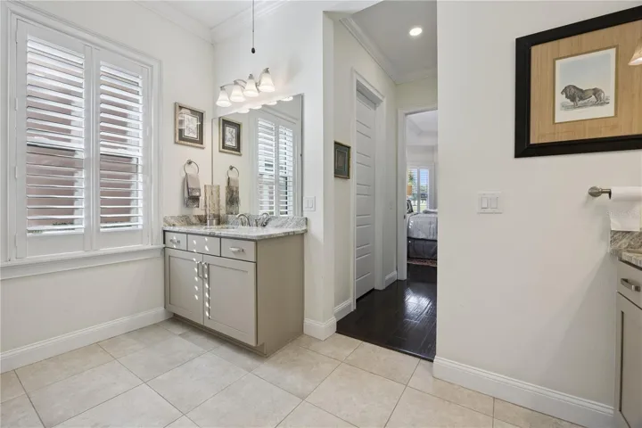 Master bath with plantation shutters.
