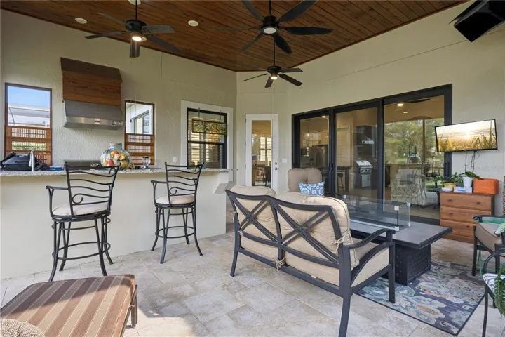 Inviting Summer Kitchen with gas grill.