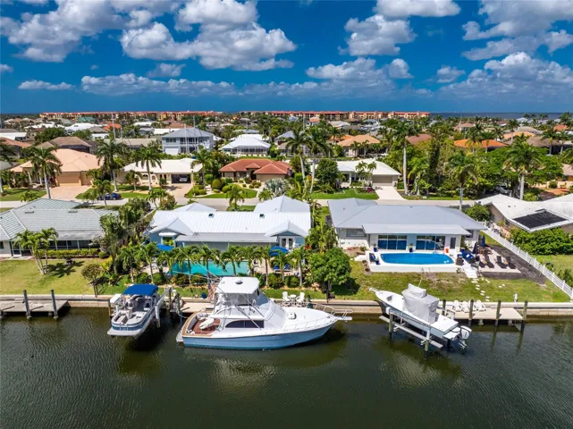 85 Ft Water-frontage. 46 Ft Dock, 8ft Finger dock, 10K Boat Lift -Designed for the avid boater