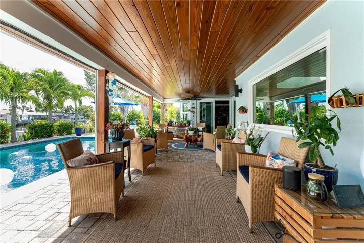This  paver deck  completes this enchanting tropical space.