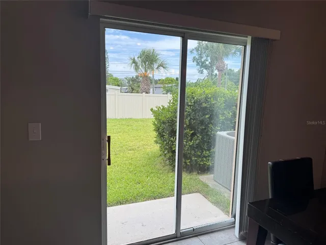 Sliding glass doors to backyard