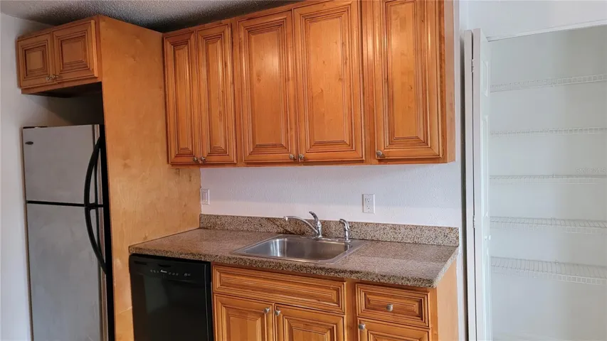 Kitchen with new refrigerator