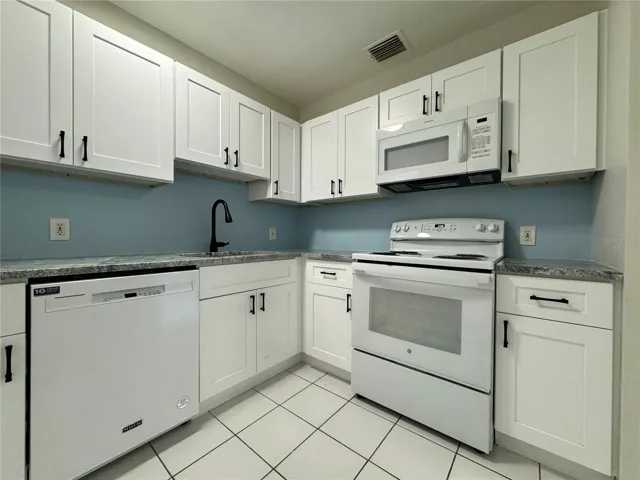 260 unit kitchen with new cabinets and appliances