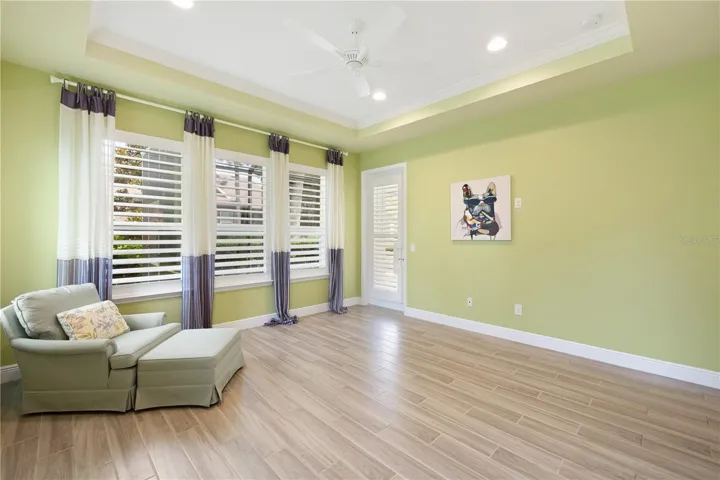 Plantation shutters and private door to lanai