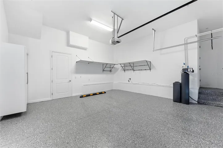 2 car garage with newer expoxy painted floor
