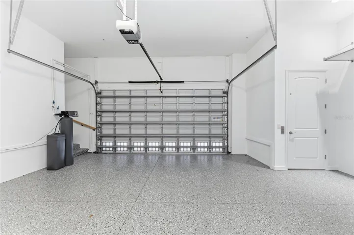 2 car garage with newer expoxy painted floor