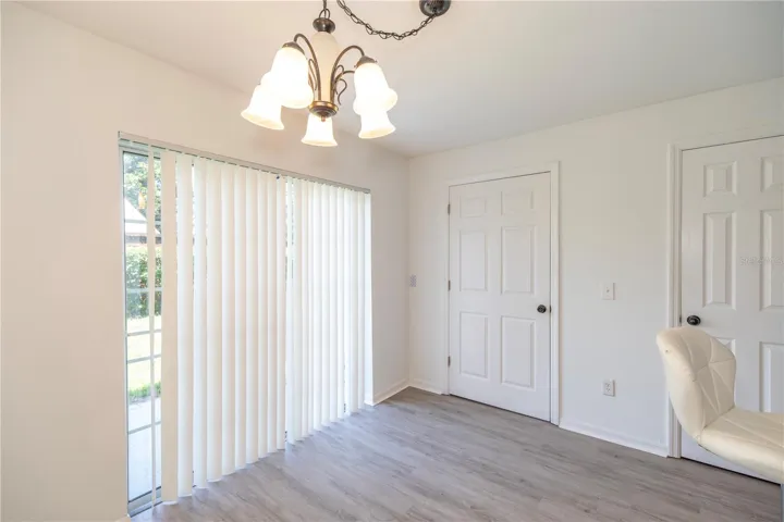 ACCESS TO THE OUTDOOR PATIO FROM THE DINING ROOM