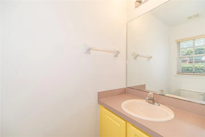 HALF BATHROOM LOCATED DOWNSTAIRS
