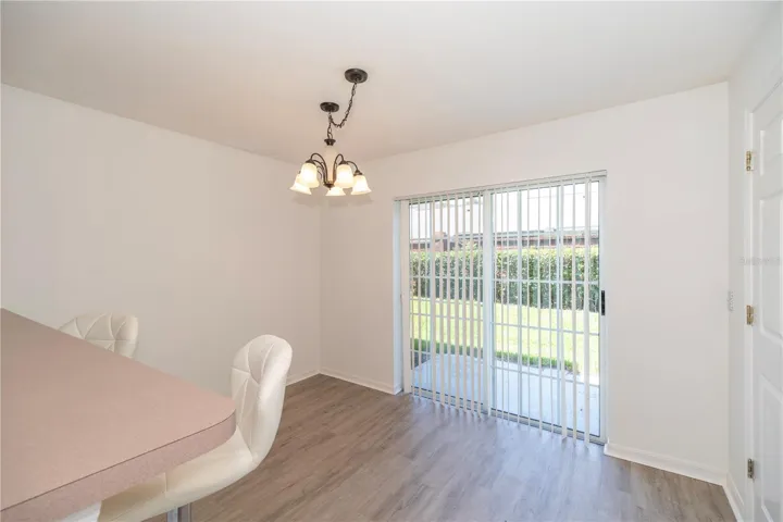 VIEWS OF THE DINING ROOM FROM THE KITCHEN