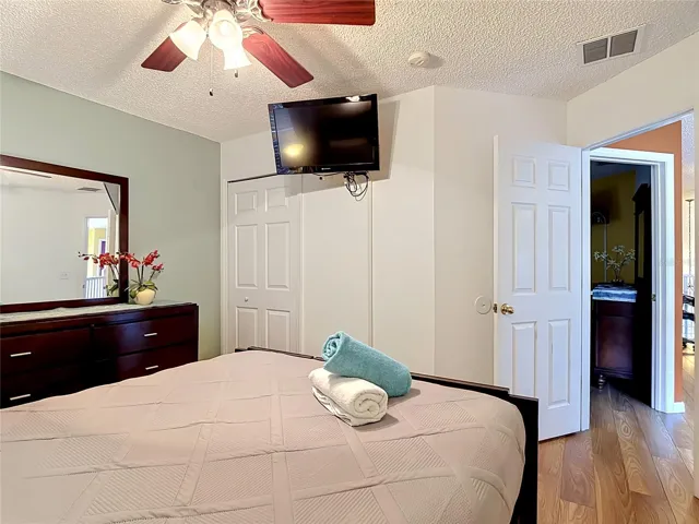 Guest Bedroom with Laminate Flooring