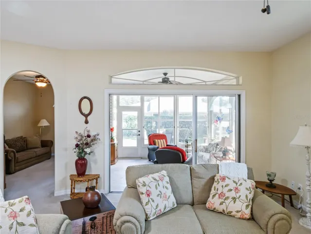 Bonus room to left of sliding doors can be used for an additional bedroom, office, den or other! Also opens through sliding doors to porch.